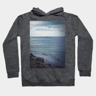 Seascape with a sailboat Hoodie